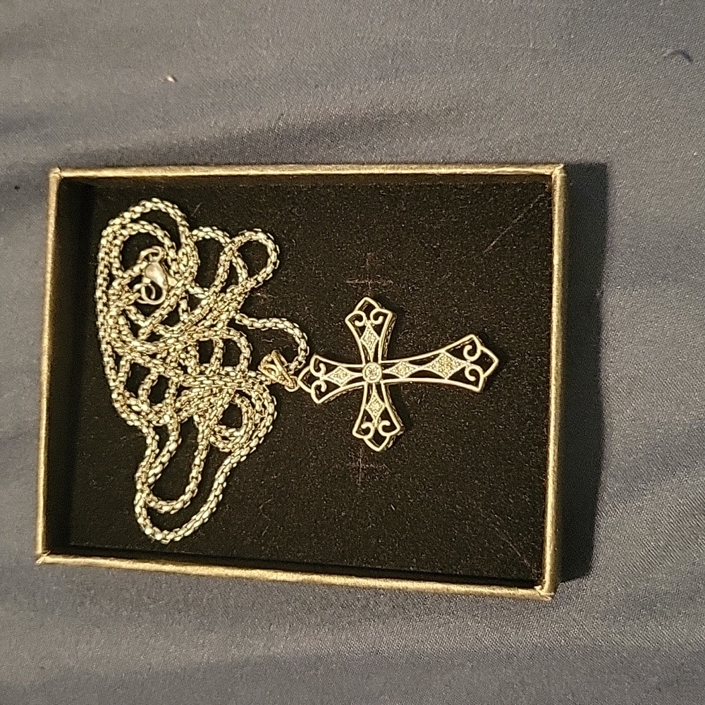 1/10 karat diamonds in sterling silver with sterling silver chain.